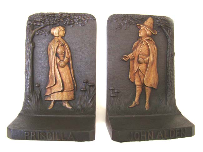 A FANTASTIC PAIR of Antique Bookends depicting the Pilgrim father John Alden and his wife Priscilla made by Bradley & Hubbard of Meriden, CT., circa 1920
